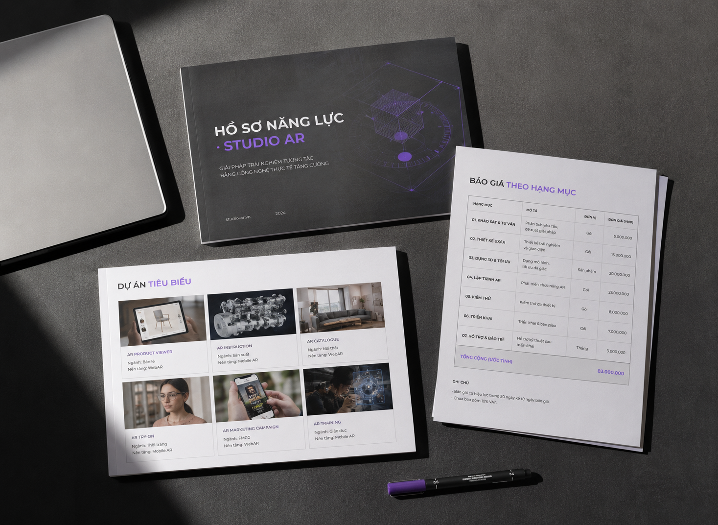 Bộ tài liệu chào hàng của studio AR gồm hồ sơ năng lực và bảng báo giá in ra